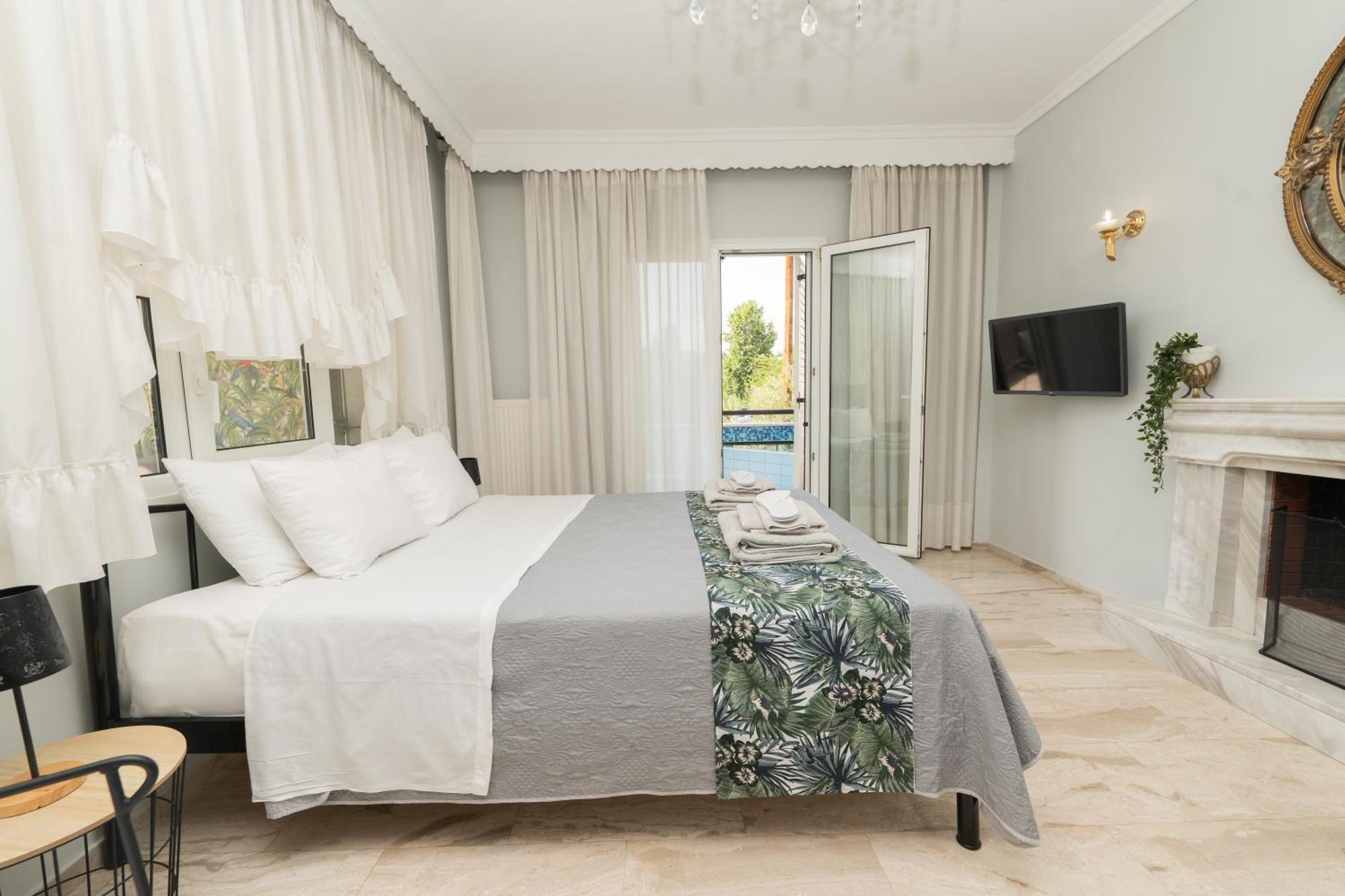 Glykanisos Suites Néa Péramos Exterior foto